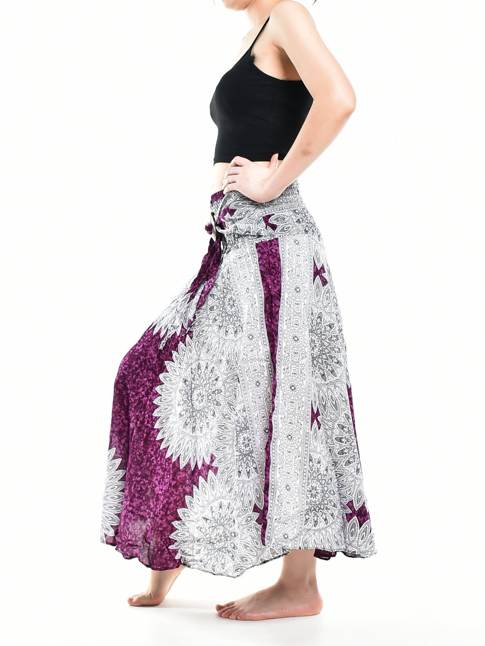 Bohotusk Purple Snowflake Long Skirt featuring a coconut buckle and smocked waist, styled elegantly for versatile wear.